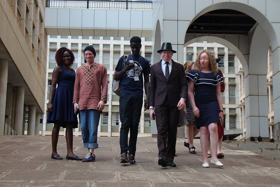 Flavia, Paul, Pat, Peter and Clowie walking out of the parliament of Ugandan after a short visit to the office of the speaker
