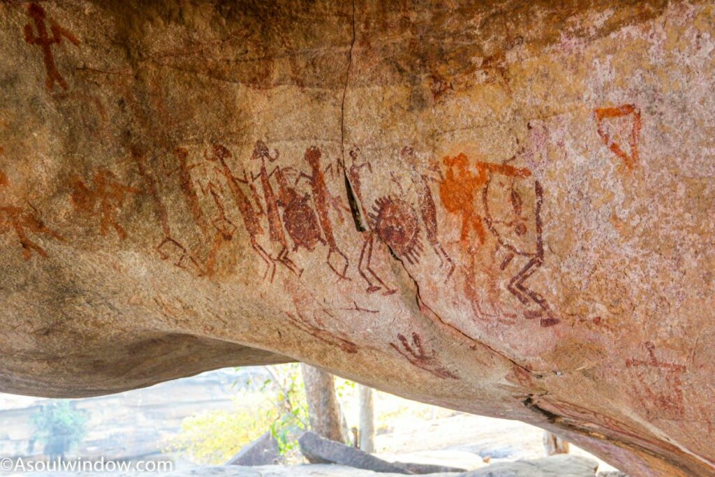 Hunting scene depicted. Pre historic cave art and paintings in Aurwatand canyon and waterfall in Chandauli near Varanasi