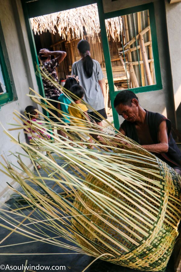 Nocte Tribe man making bamboo basket. Upper Nocte village Laho