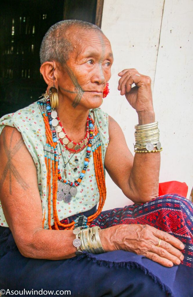 Tattooed and shaved Ollo Nocte Woman in Lazu village, near India Myanmar border. Arunachal Pradesh