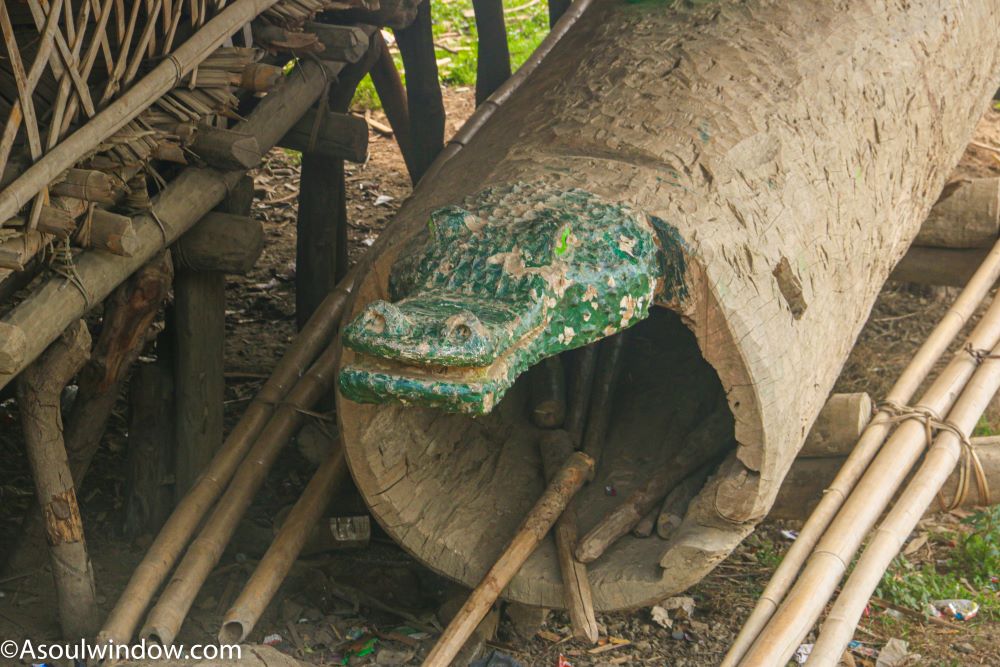 Crocodile shaped tham or log drum in a morung in Lazu village of Ollo Nocte Tribe. Near Khonsa in Arunachal Pradesh