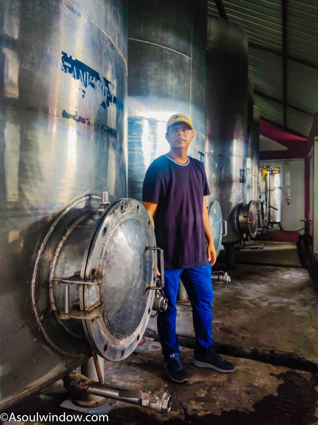Author Abhinav Siingh from A Soul Window posing with Stainless steel barrel at Champhai Winery Mizoram