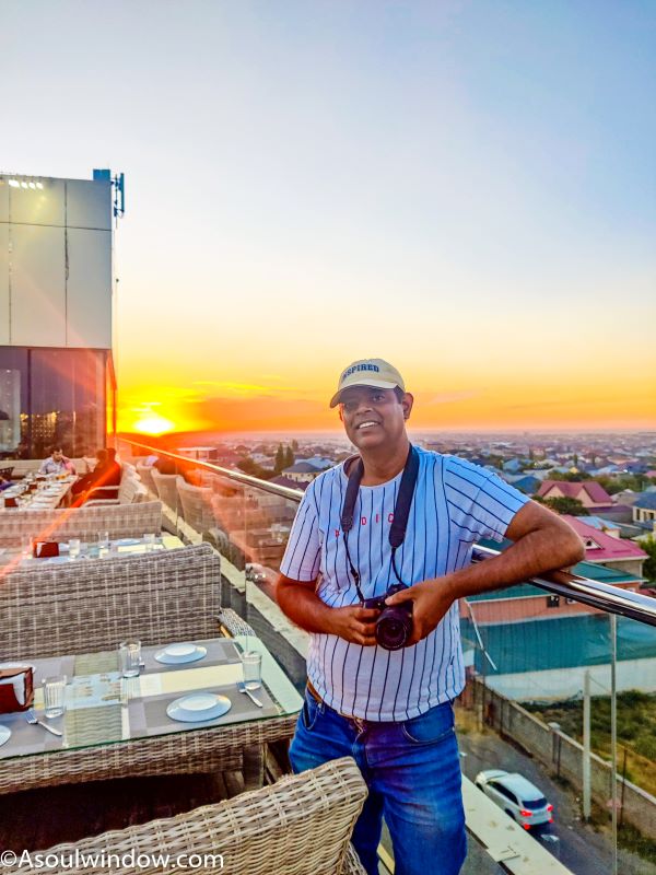 Abhinav Singh travel blogger Sunset at roof top chechil pub bar and restaurant Shymkent Kazakhstan Central Asia