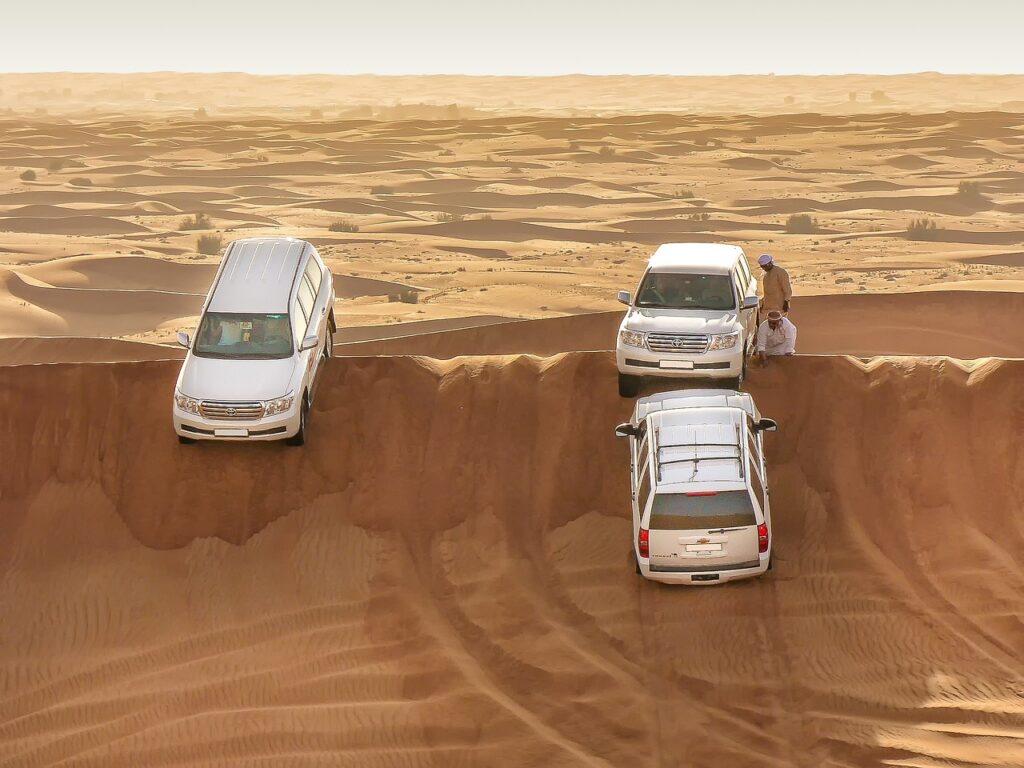 Overnight desert jeep safari Dubai United Arab Emirates sand dunes